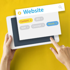 A person uses a tablet with an overlay showing a website search interface and keyword tags including Content, SEO, SEM, Concept, and Words on a yellow background. | Miss Cieline